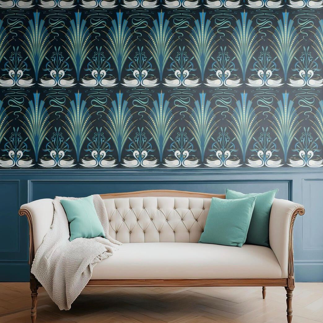 Untitled Blue and teal Art Deco swan wallpaper behind a cream tufted sofa with aqua accent pillows in a refined living room.