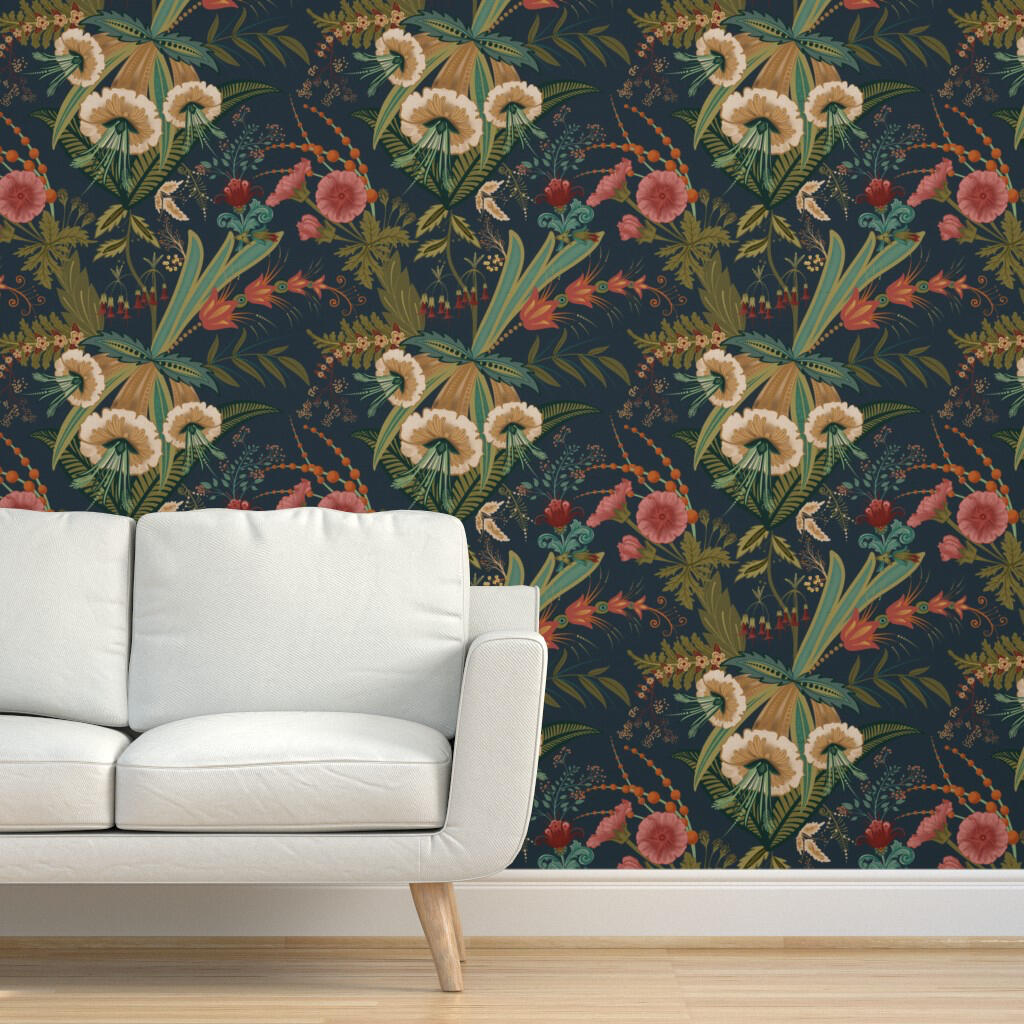 Untitled White sofa positioned in front of ornate Victorian botanical wallpaper with vintage-inspired flowers and layered greenery.