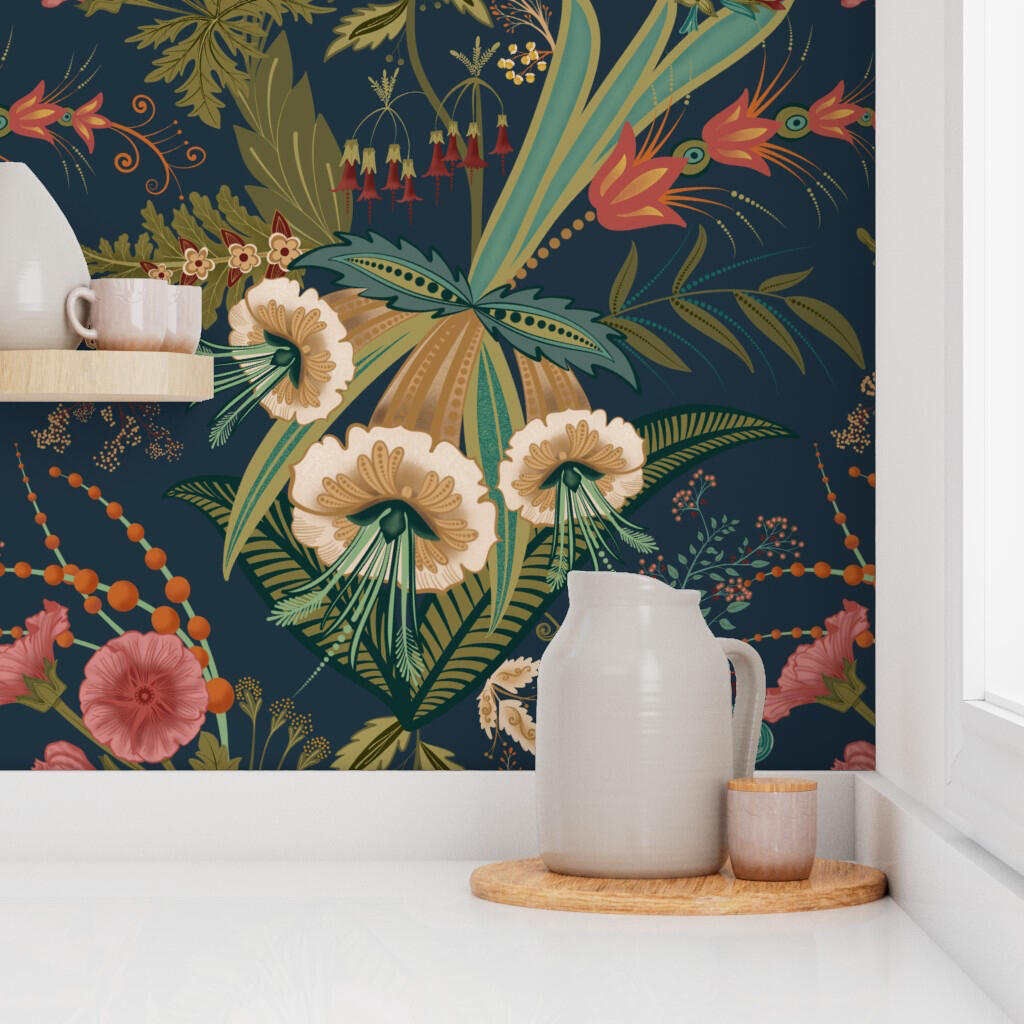 Close-up view of colorful botanical wallpaper showcasing cream flowers, tropical foliage, coral blooms, and intricate greenery as the backdrop to a kitchen counter.
