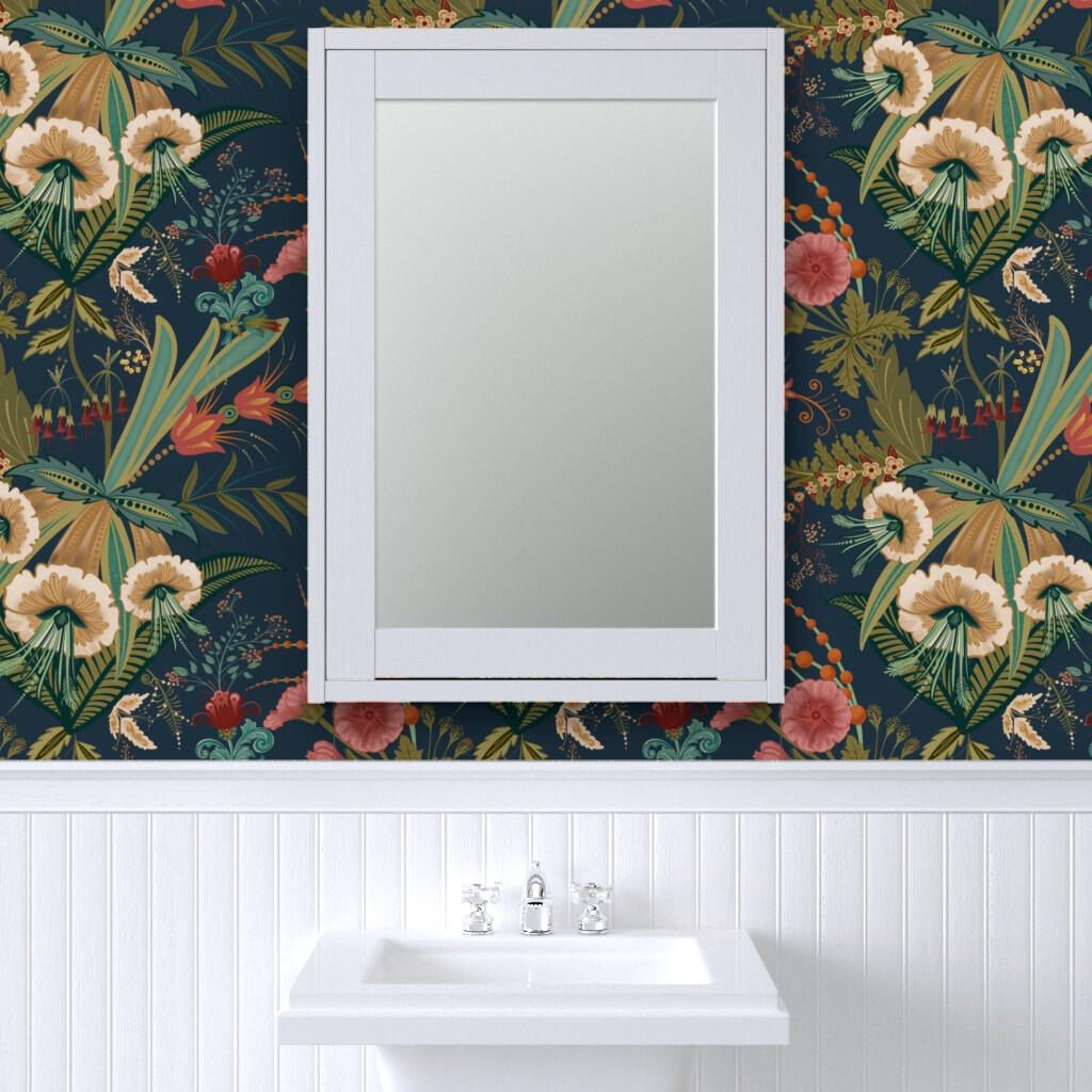 Untitled White bathroom vanity and mirror framed by dark floral wallpaper featuring cream blossoms, tropical leaves, and coral flowers.