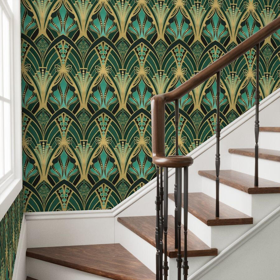 Untitled Staircase wall covered in Art Deco wallpaper with ornate gold geometric fan designs and jewel-toned teal accents.