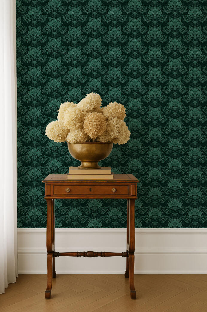 Untitled Vintage wood side table with cream hydrangeas set against dark green damask wallpaper and white molding.