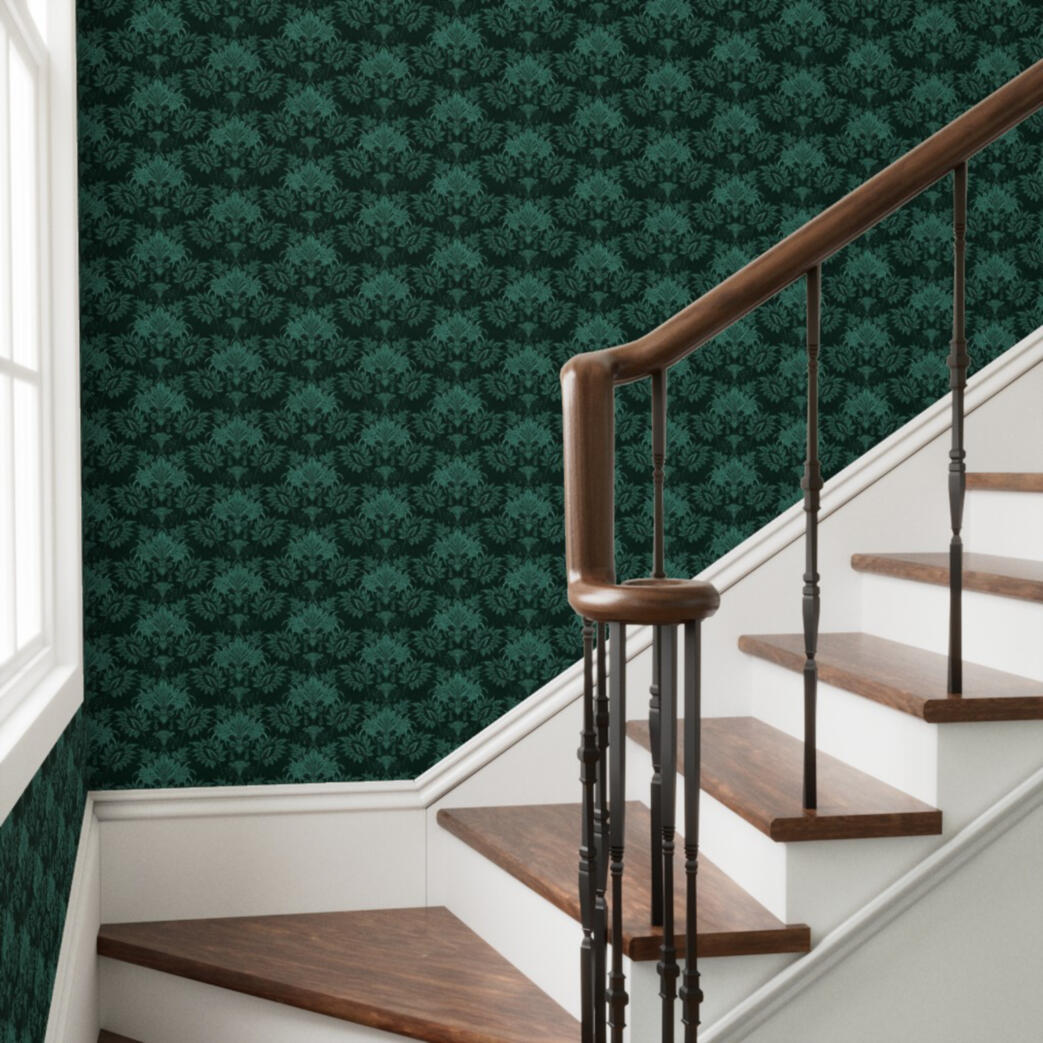Untitled Moody green damask wallpaper displayed along a staircase with dark wood handrails and white trim.
