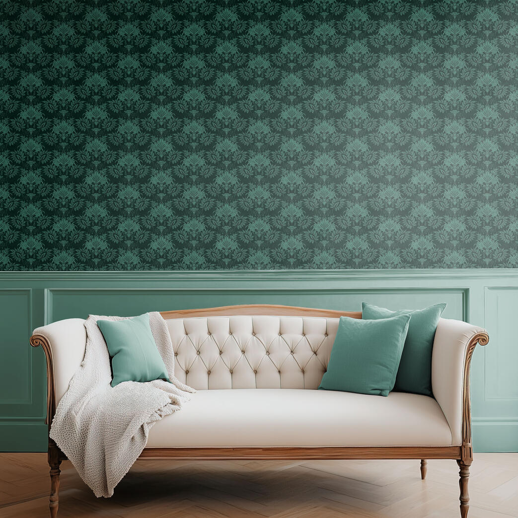 Untitled Dark emerald green damask wallpaper behind a cream tufted sofa with teal accent pillows and classic wall paneling.